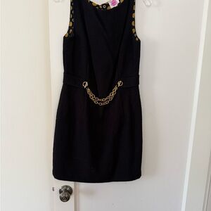 Chic Black Dress with Gold Chain Detail